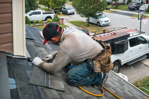 Professional Roofing technician working in Somerville, TX